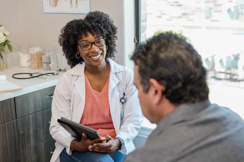 Man talking with doctor
