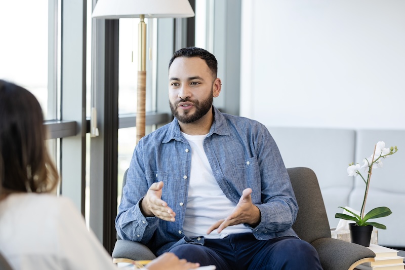 Man talking with woman